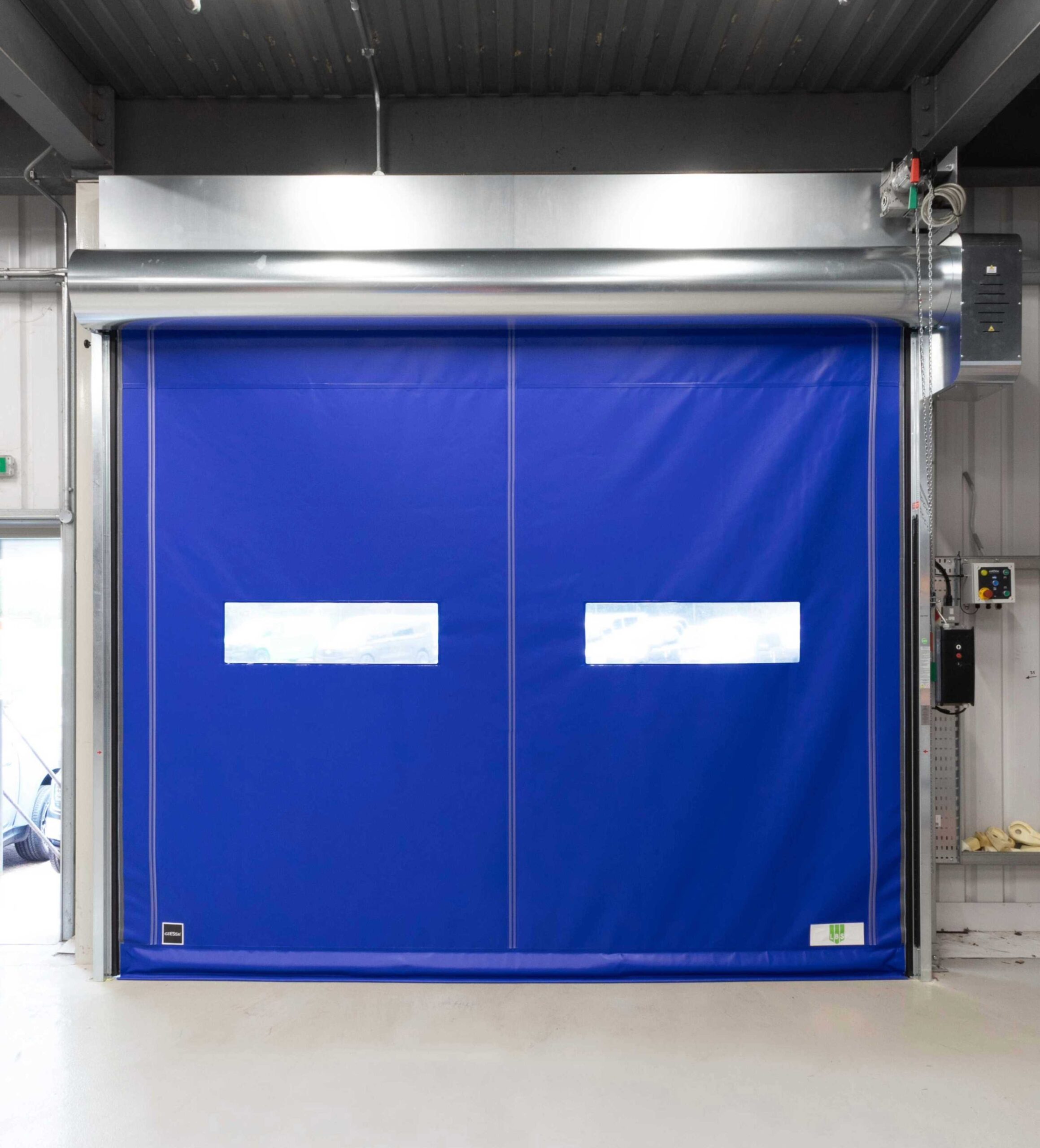 Blue automotive speed door with bluetooth connectivity
